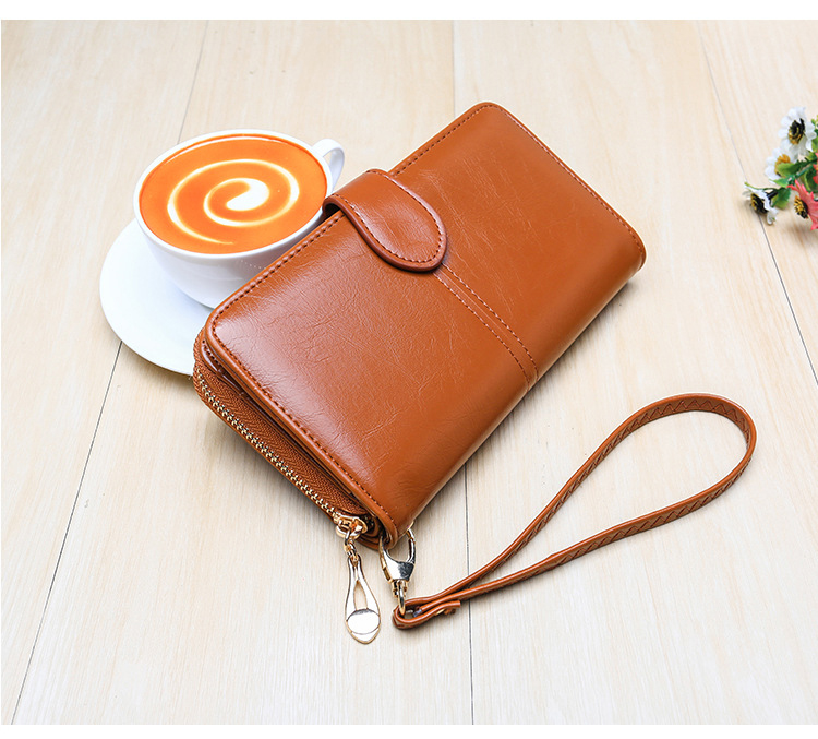 Compact Wallet and Clutch with Wrist Strap Compact Wallet and Clutch with Wrist Strap