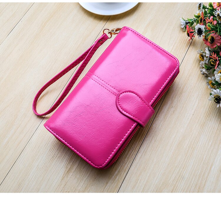 Compact Wallet and Clutch with Wrist Strap Compact Wallet and Clutch with Wrist Strap