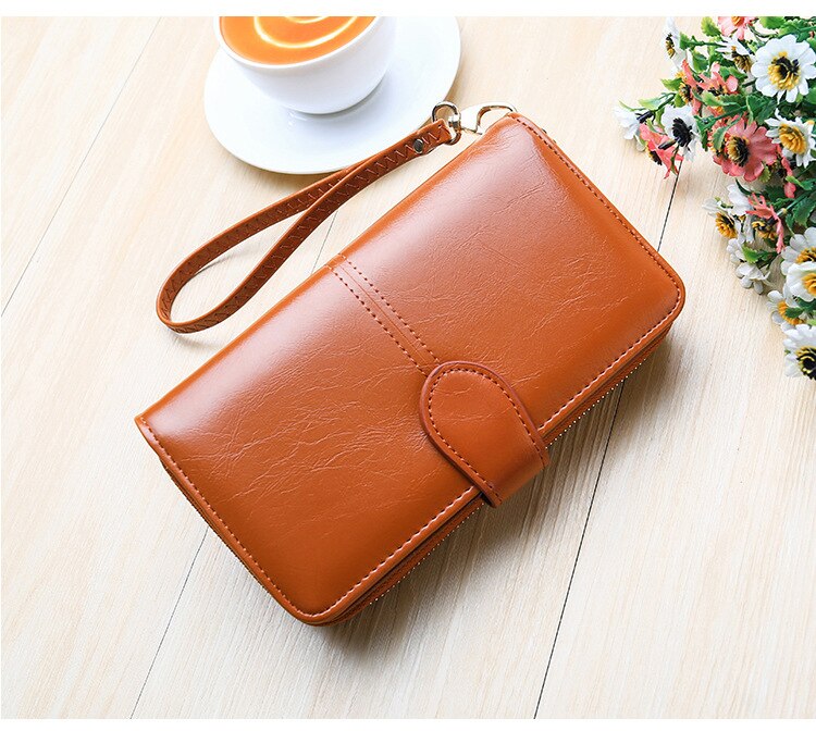 Compact Wallet and Clutch with Wrist Strap Compact Wallet and Clutch with Wrist Strap