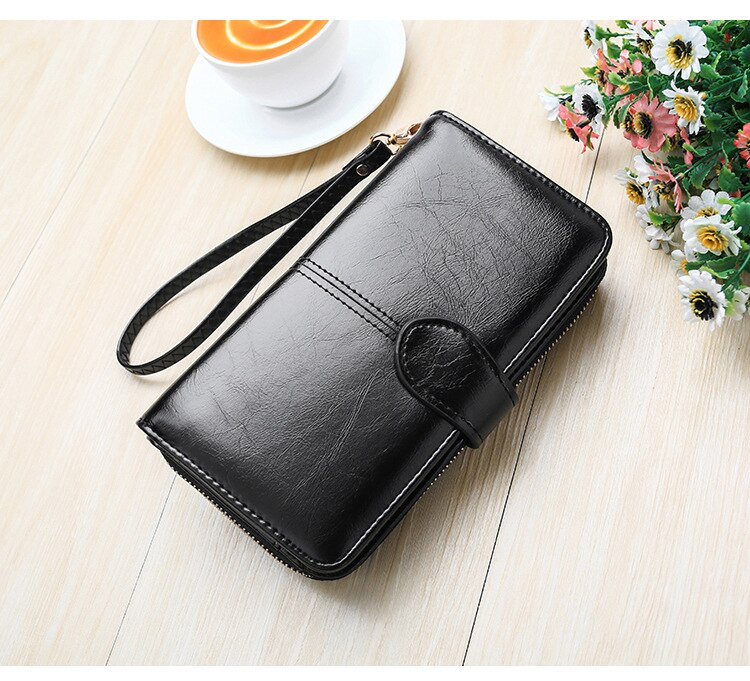 Compact Wallet and Clutch with Wrist Strap Compact Wallet and Clutch with Wrist Strap